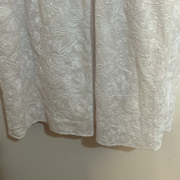 Rafaela D’Angelo. White boho or beach maxi dress.